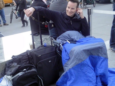 Blogger Richard Gutjahr is currently first in line to get an iPAd at Apple's flagship 5th Ave. store. He bumped professional line sitter Greg Packer, who didn't reserve an iPad.