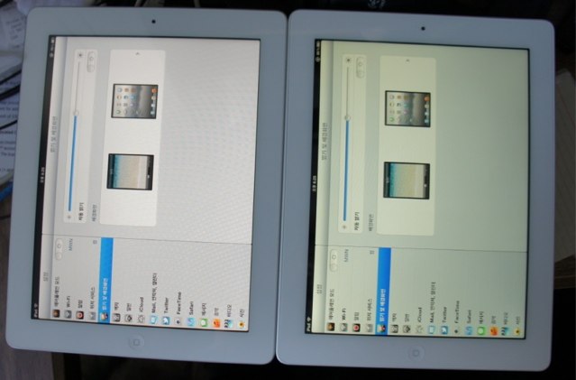 It's pretty clear in this image that the new iPad's Retina display (right) is suffering from a horrible yellow tint.