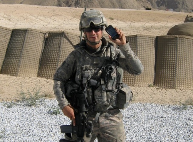 AT&T will unlock in-contract iPhones for deployed service men so that the handset can be used with other carriers abroad.