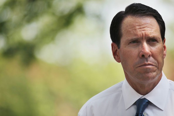 Randall Stephenson playing the world's saddest song on the world's smallest violin.