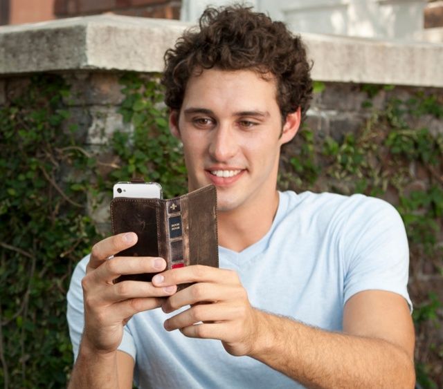 No more holding your iPhone in its BookBook like this to take a picture.
