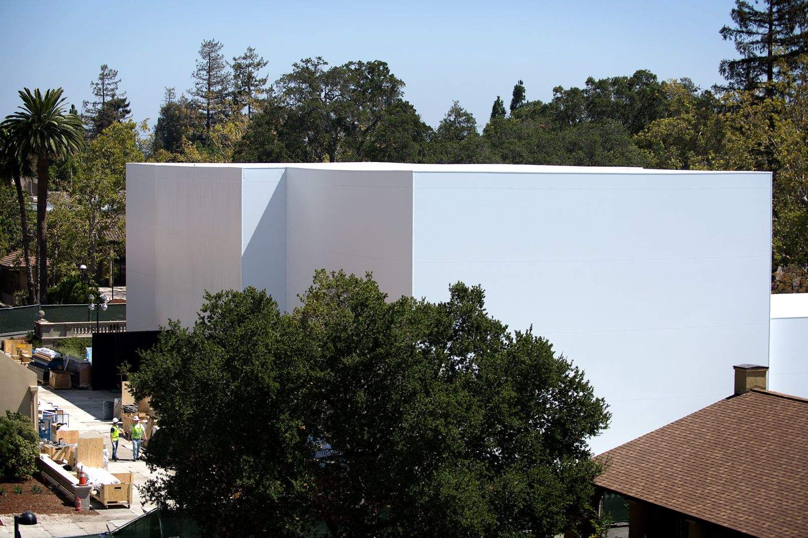 CUPERTINO, California -- What's inside the mystery building Apple is fabricating for its big September 9 event? The giant construction project is almost as big of an enigma as what the iWatch will actually look like or do.


The boxy structure, which sprang up behind the Flint Center for the Performing Arts here on the De Anza College campus, looks like a cross between an igloo and a winning confection on Cake Wars.  Naturally, the enormous two-to-three story building sparked intense curiosity among the Apple faithful when pictures emerged Thursday, so we had to go take a look for ourselves.


Will it hold something as mundane as a demo area where tech journalists can fondle Apple's latest, greatest gear? Does it contain a full-size home of the future to show off amazing HomeKit implementations? Will it house a runway for an Apple wearables fashion show or a giant stage for a post-announcement Dr. Dre concert?


Whatever it holds, it is truly a massive undertaking. It's surrounded by green fences and countless security guards. We, like you, can't wait for Apple's big reveal &mdash; here's what we saw walking around the outskirts of the secretive project Thursday afternoon.