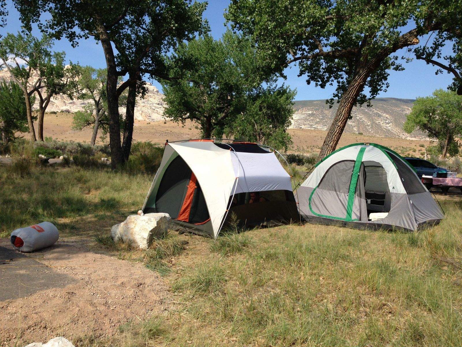 REI's Hobitat 6 tent is a spacious car-camping tent that's surprisingly quick and easy to set up and break down. My teenage son managed to put it up on his own the first night working with a feeble flashlight. After that he became very proficient at putting it and pulling it down, though a 10-minute job became a five-minute one with some assistance from his siblings. Once up, the Hobitat was big and sturdy. We never staked it down or used guy wires, but it stood firm in several thunderstorms and didn't leak a drop.  


Unfortunately, the Hobitat 6 is no longer available, but REI's Kingdom 6 ($439) is very similar.
