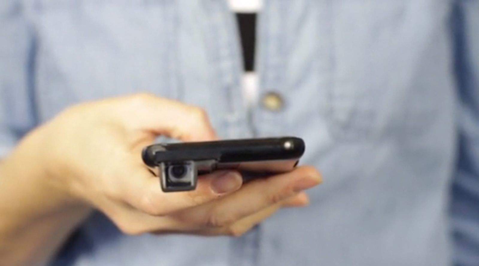 Take photos unobtrusively with people around you thinking you're checking your messages.