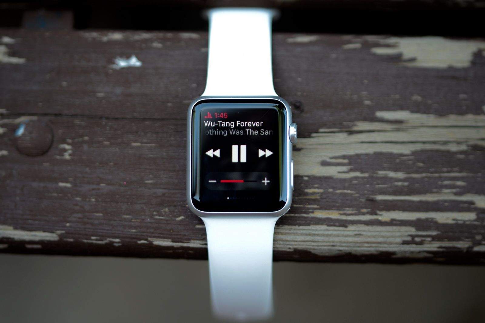 You can use the music glance to snap pics.