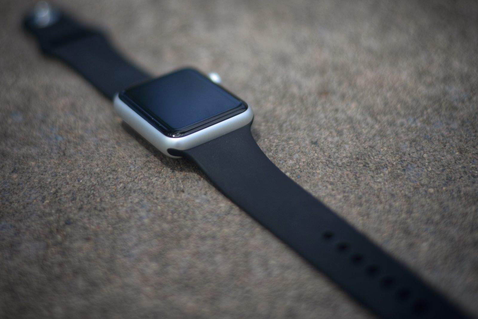 Apple Watch sport with black fluoroelastomer band.