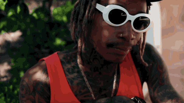 Wiz loves two things: Apple Watch and weed. But mostly weed. Photo: