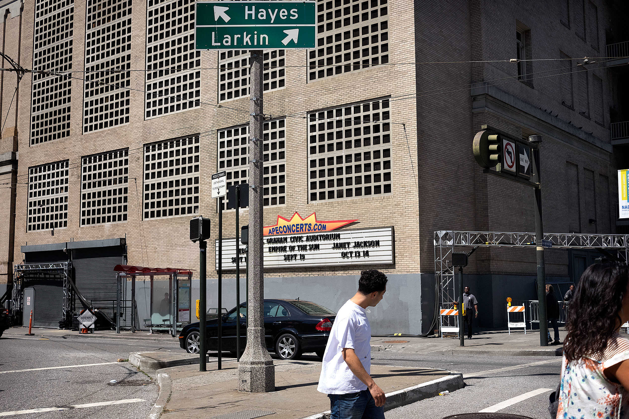 The nondescript exterior of the Bill Graham Civic Auditorium doesn't give an inkling what Apple's up to inside.