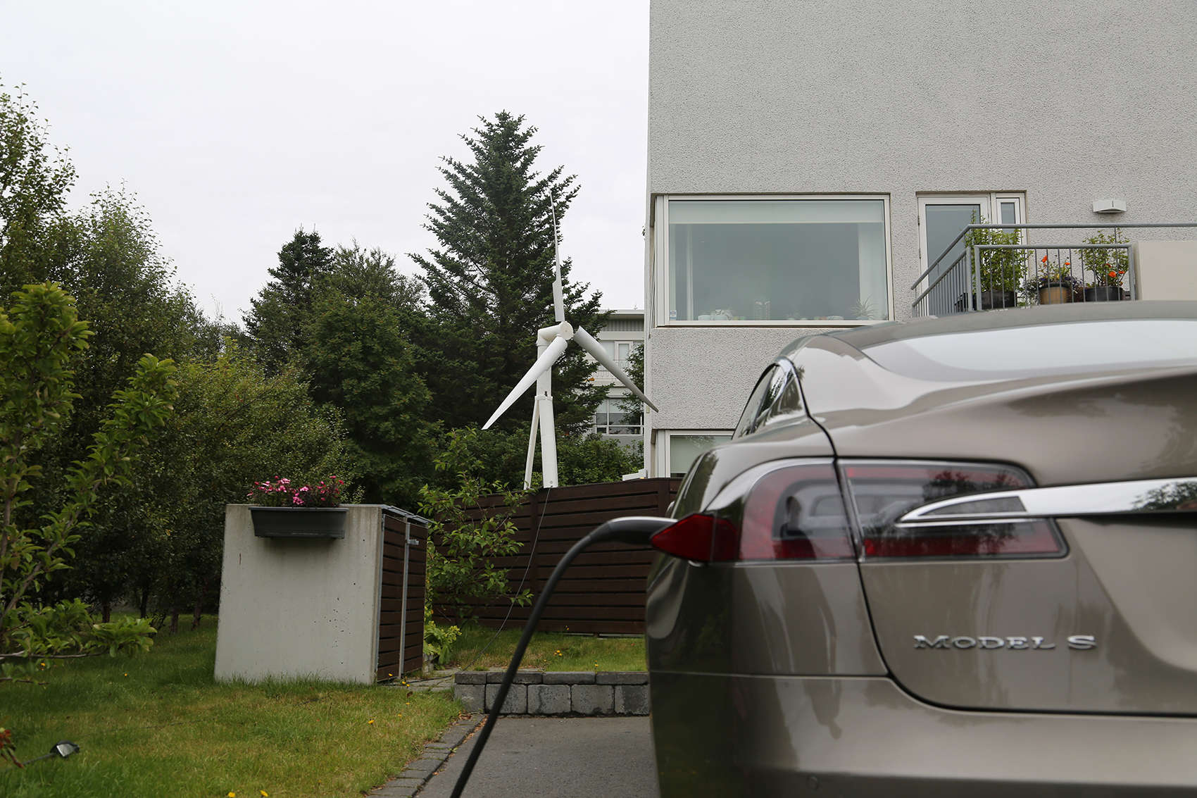 A Trinity turbine powering a house and an electric car.