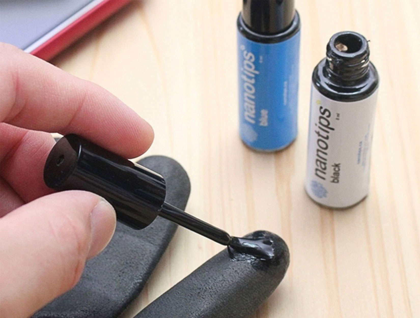 Nanotips can make gloves of all materials touch-enabled for touchscreen devices.