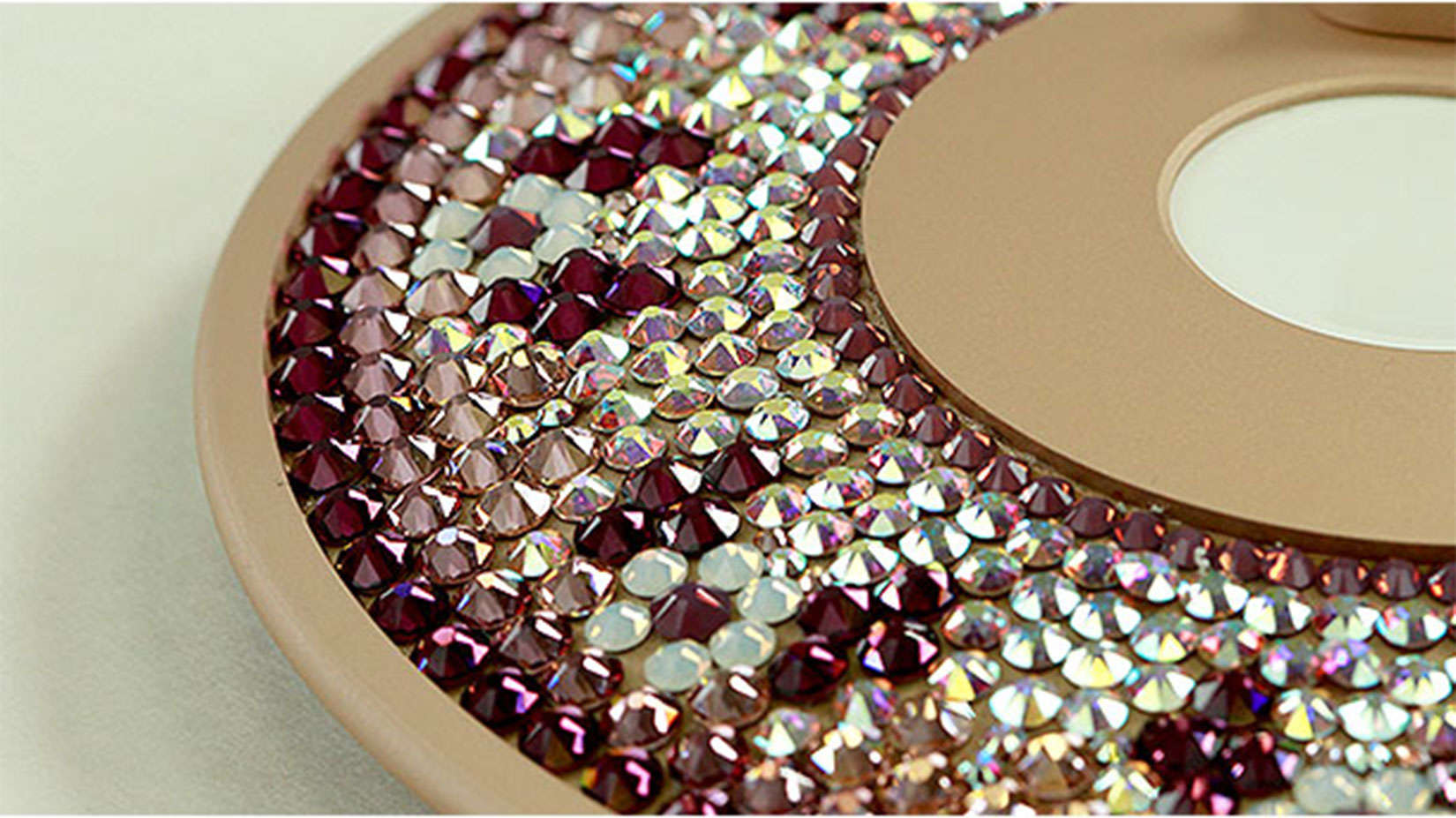 This crystal-encrusted charging dock for the Apple Watch and iPhone can be had for $5,000.