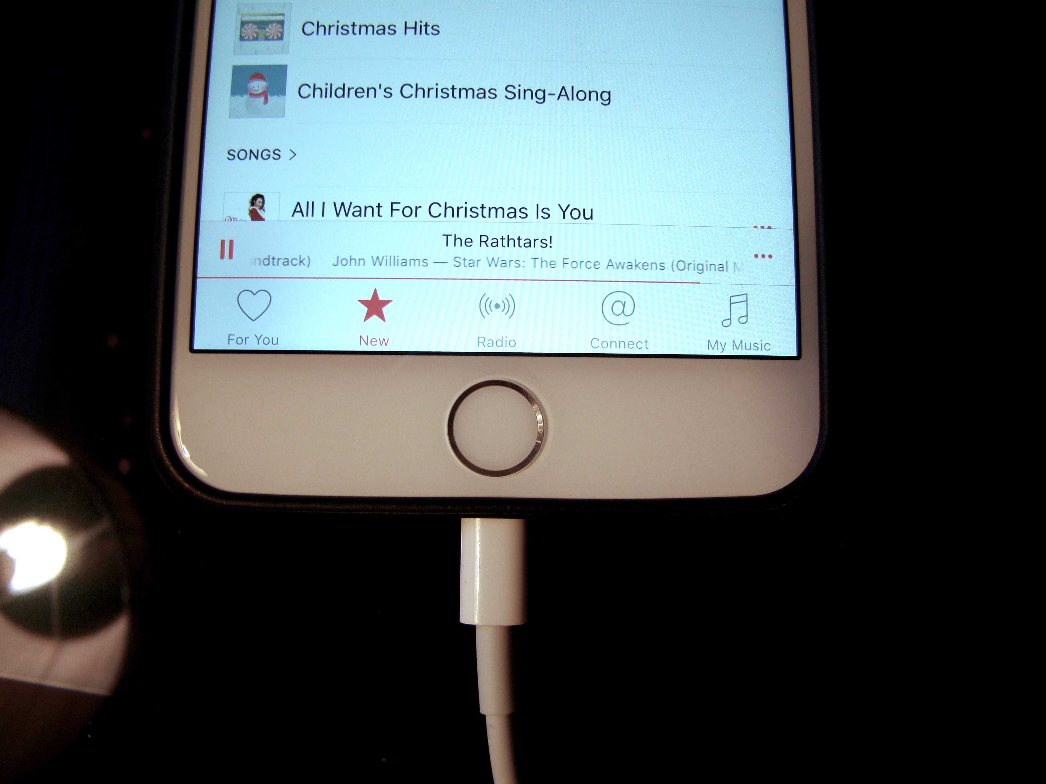 Disconnect  your iPhone while still connected via USB and charge without iTunes bugging you.