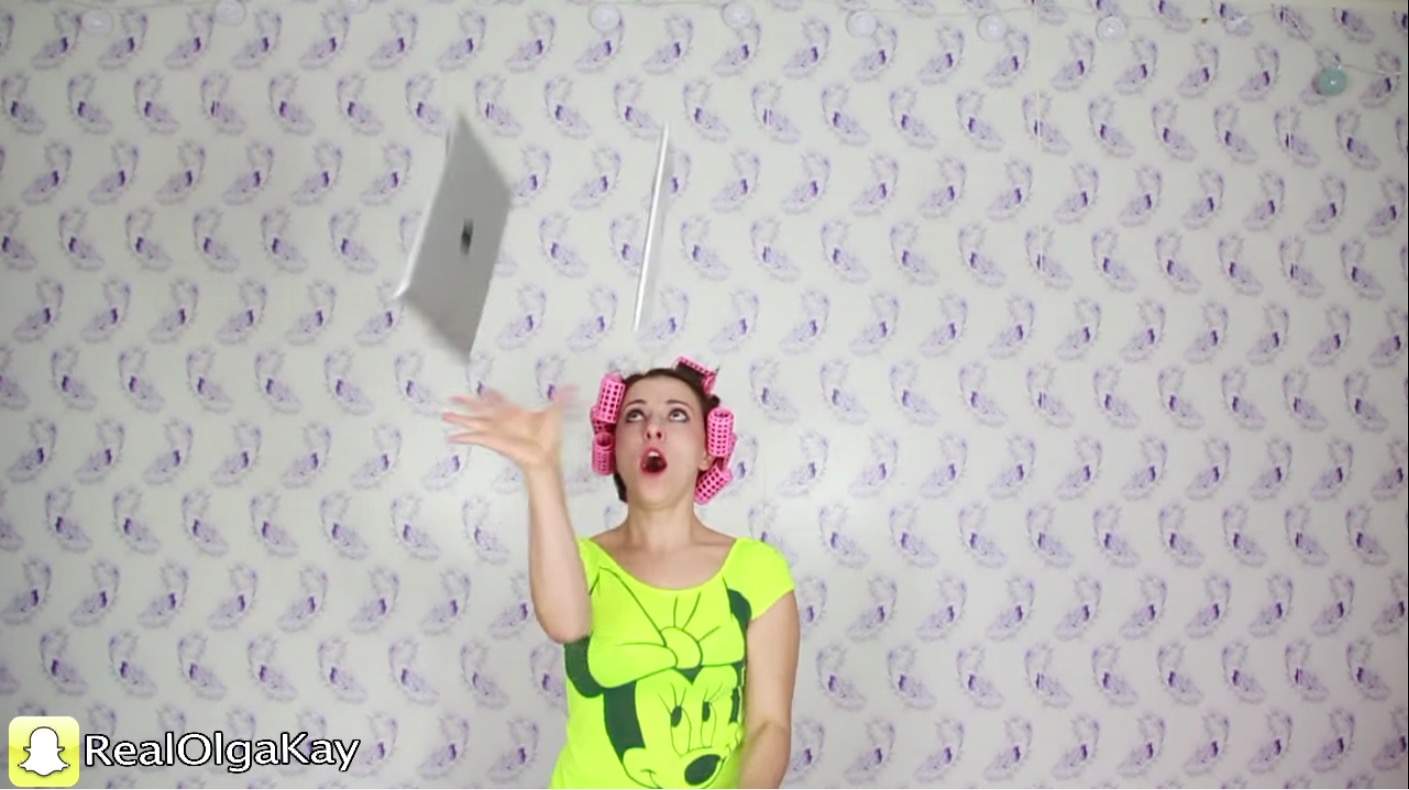 Olga Kay shows off her mad iPad juggling skillz.