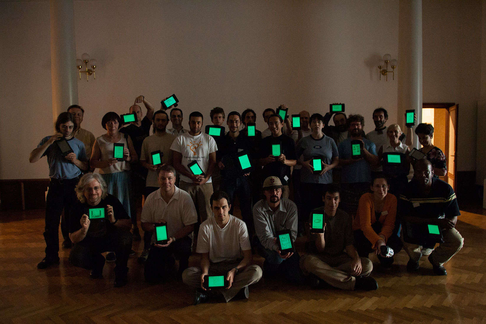 Keeping the light on. A group of enthusiasts who keep their Apple Newtons aglow.