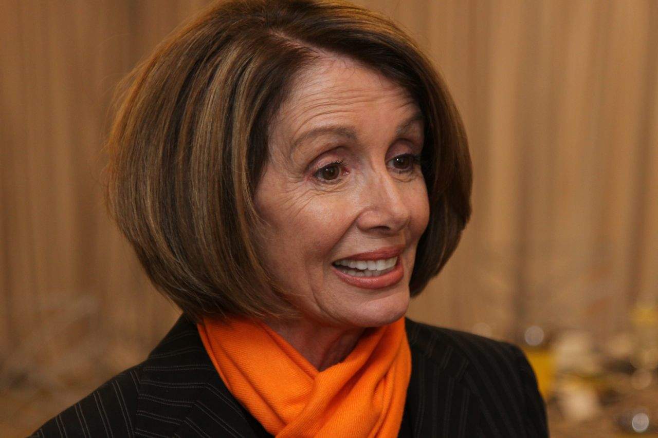 Minority Leader Nancy Pelosi is mad at Tim Cook.