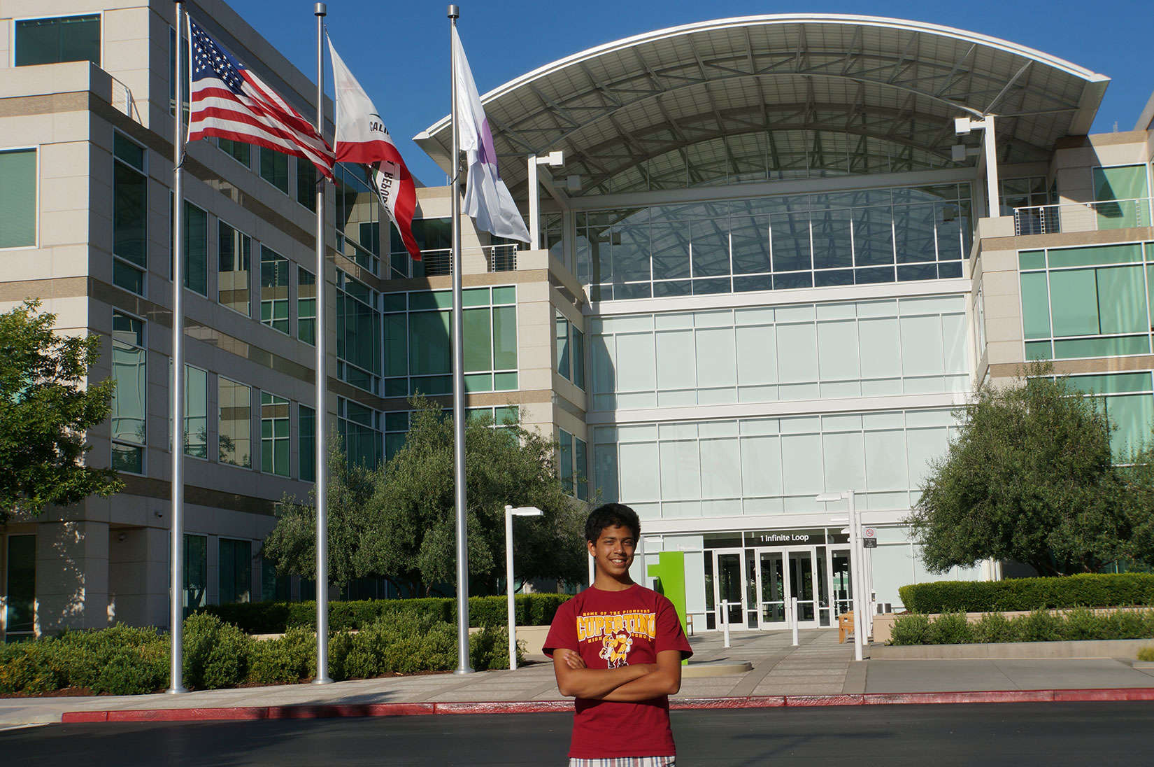 Varun Shenoy, standing outside Apple headquarters, created an app to summarize the news.