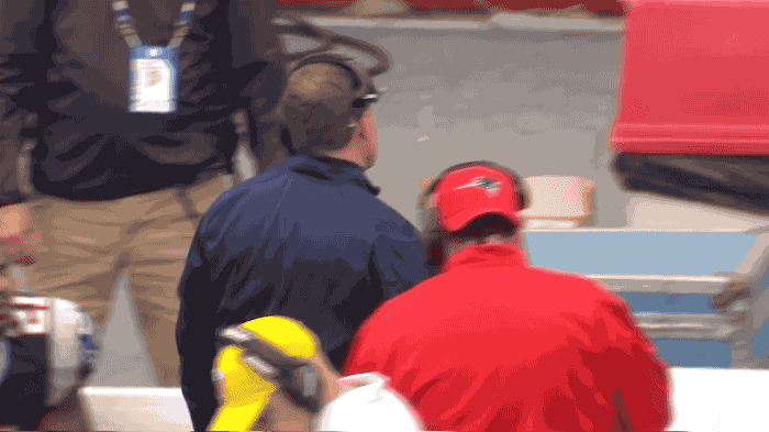 Patriot's head coach Bill Belichick slams Microsoft tablet during game.