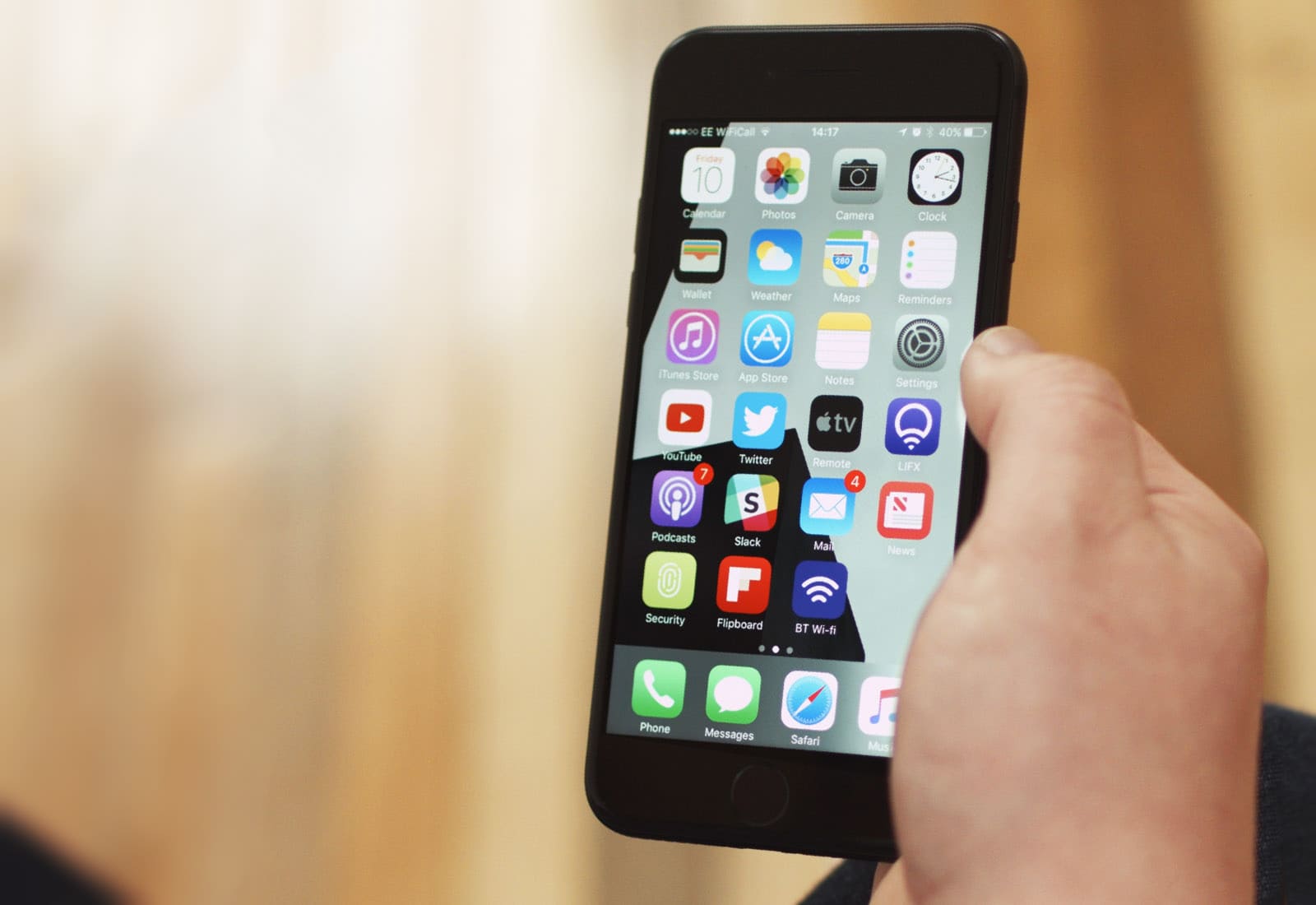 iPhone 7 in hand