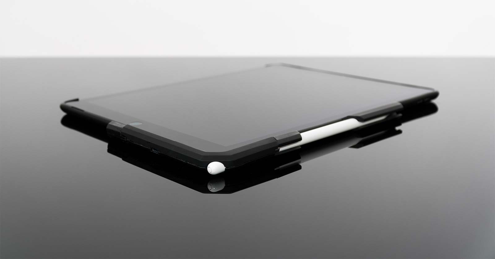The ProBack stores and charges the Apple Pencil and even has a place for the pencil cap.