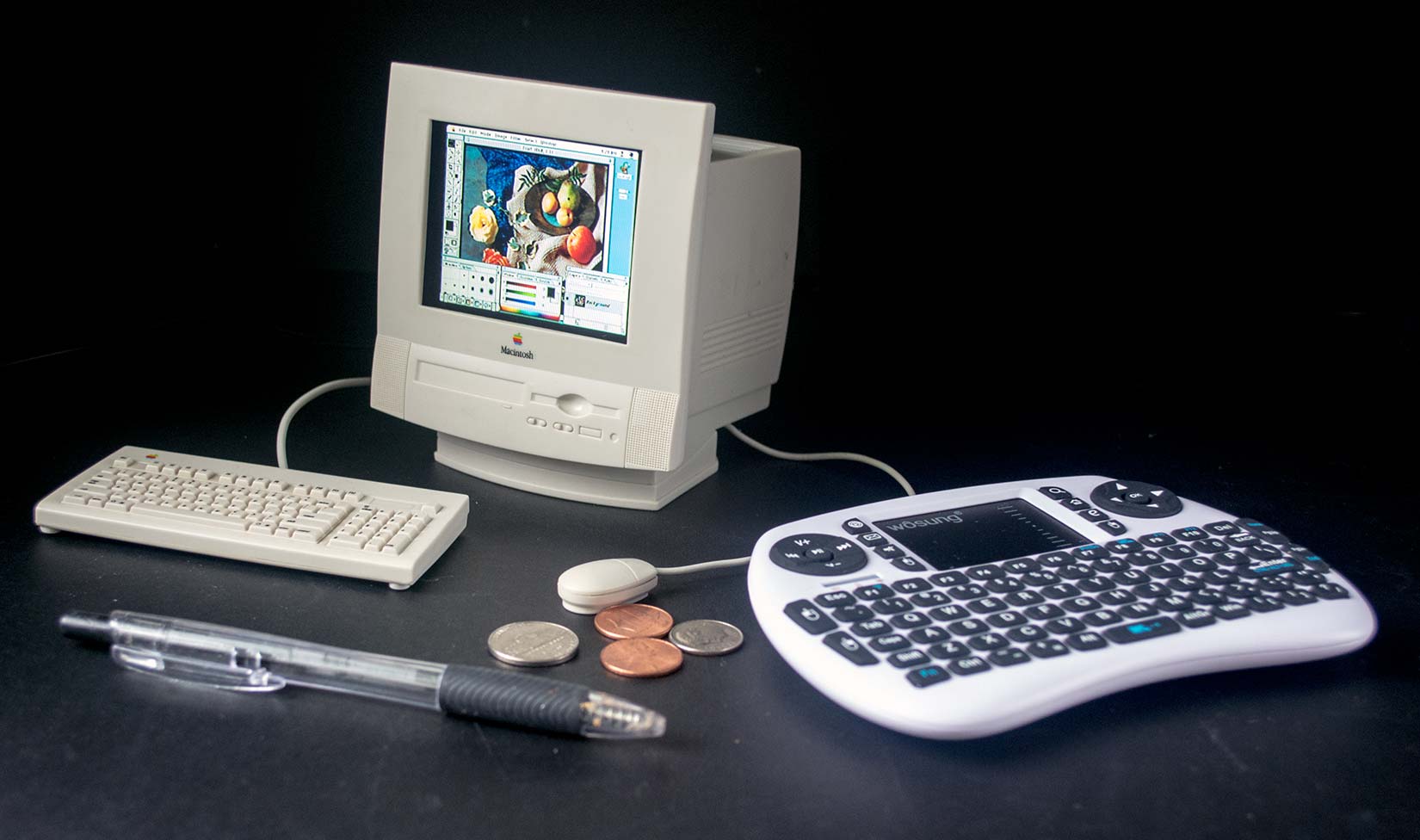 This tiny toy Mac runs Photoshop for work on tiny pictures.