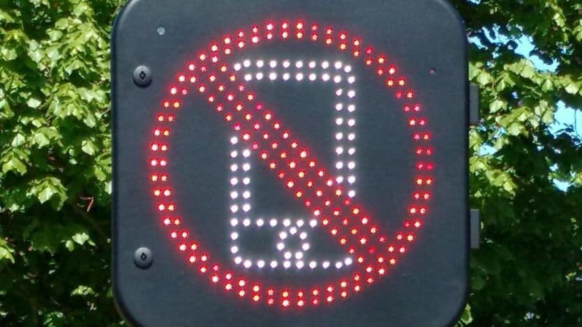 UK Street signs watching for motorists using their phones are being tested .Big Brother anyone?