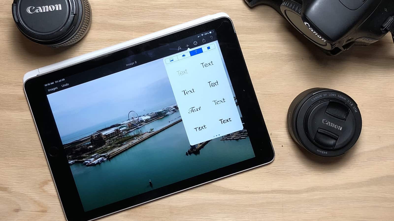 Pixelmator on iPad surrounded by camera gear