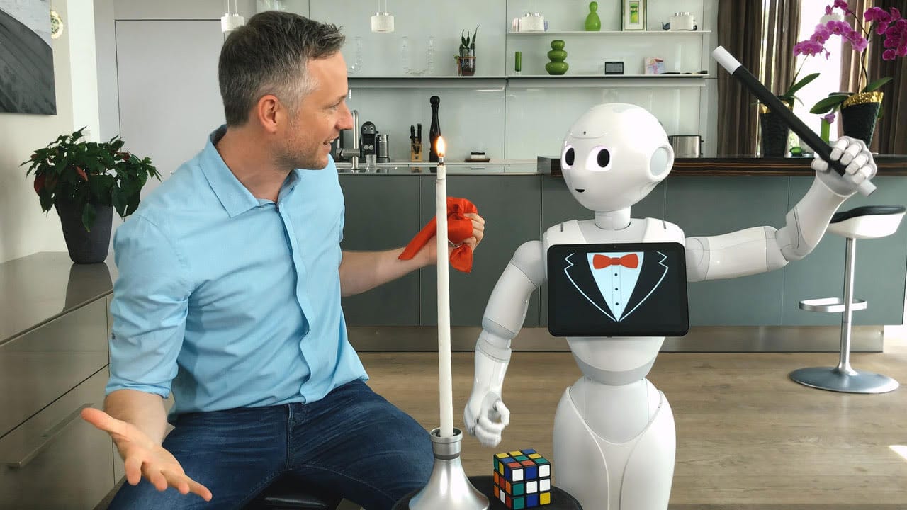 iPad magician Simon Pierro and his new assistant Pepper