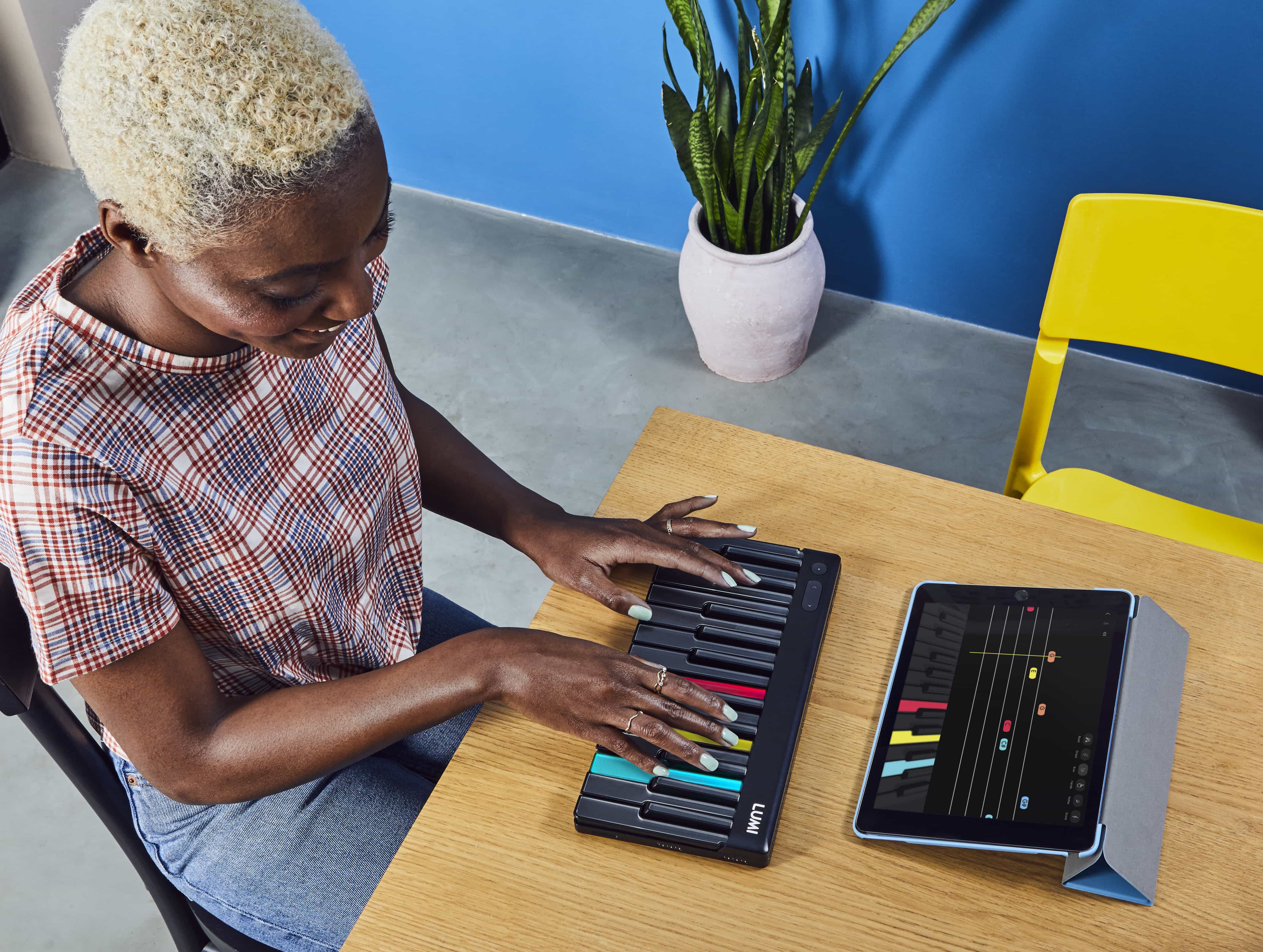 musician playing roli lumi