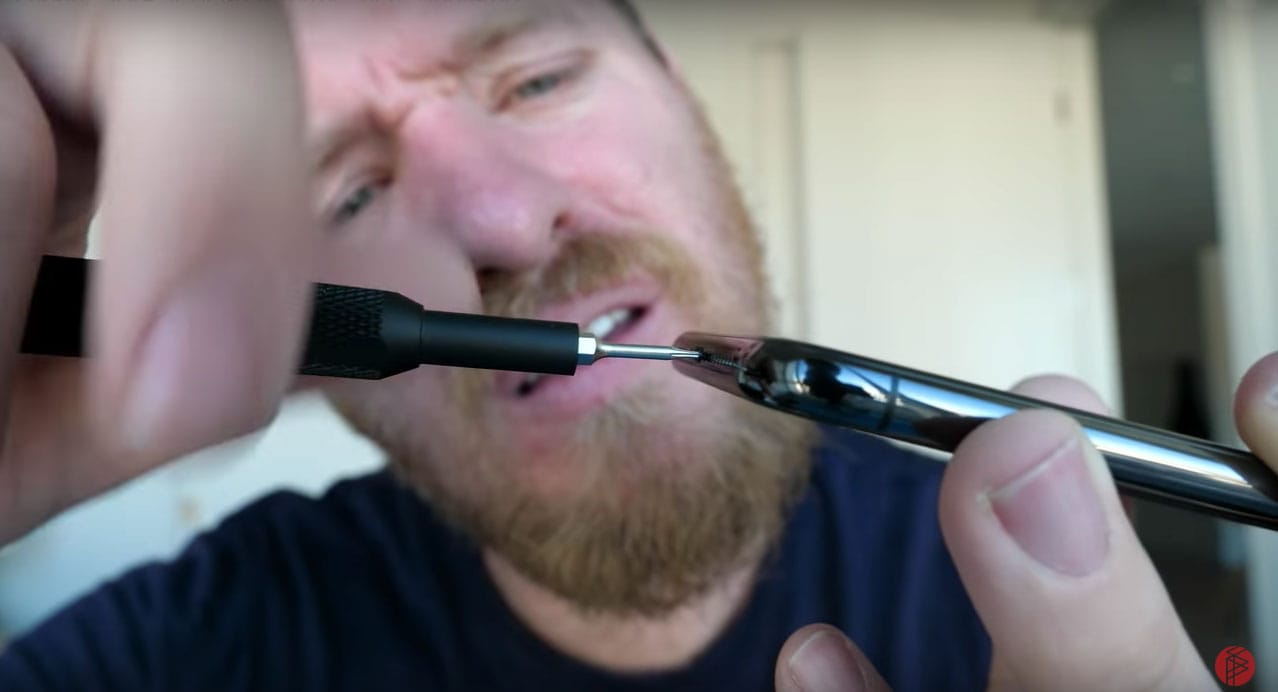Scotty Allen taking apart an iPhone 11 Pro