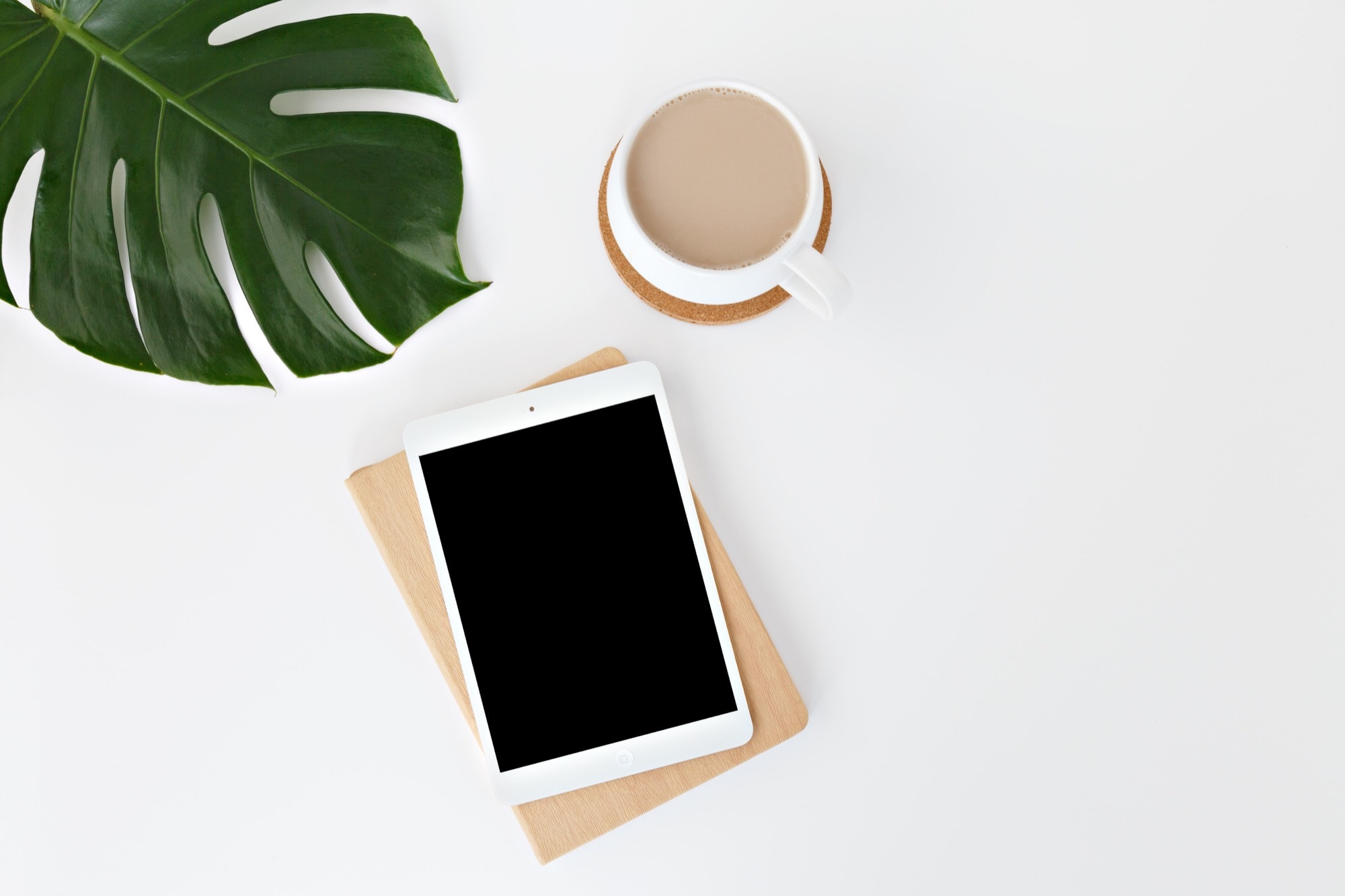iPad on desk with coffee work from home iOS