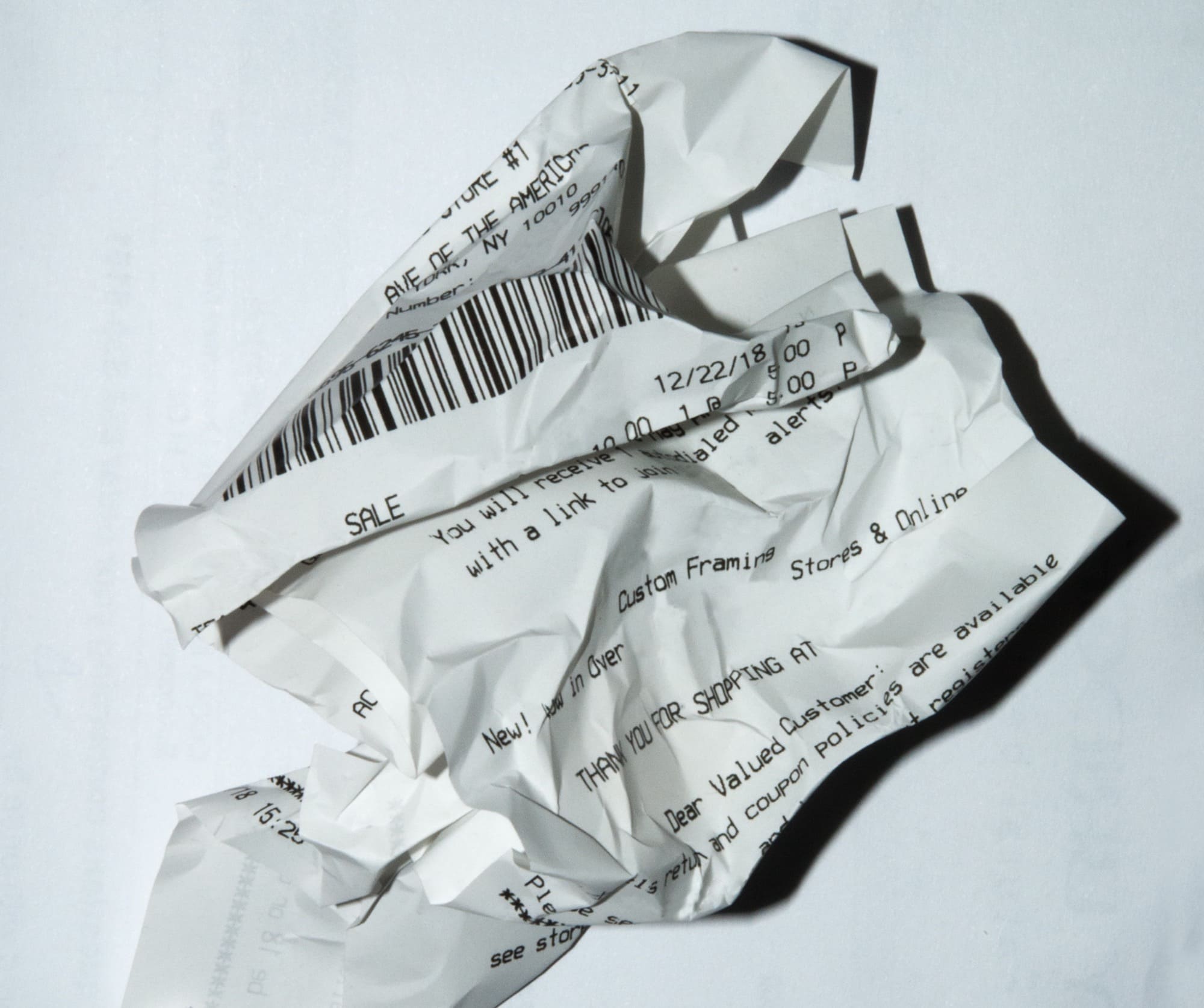 a crumpled up paper receipt