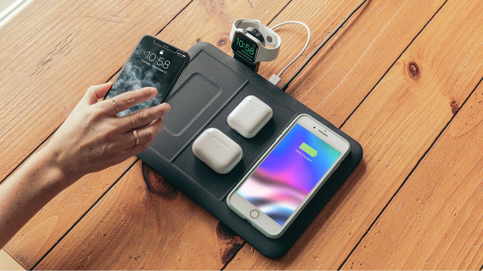 The Mophie 4-in-1 Wireless Charging Mat can actually handle five devices at once.