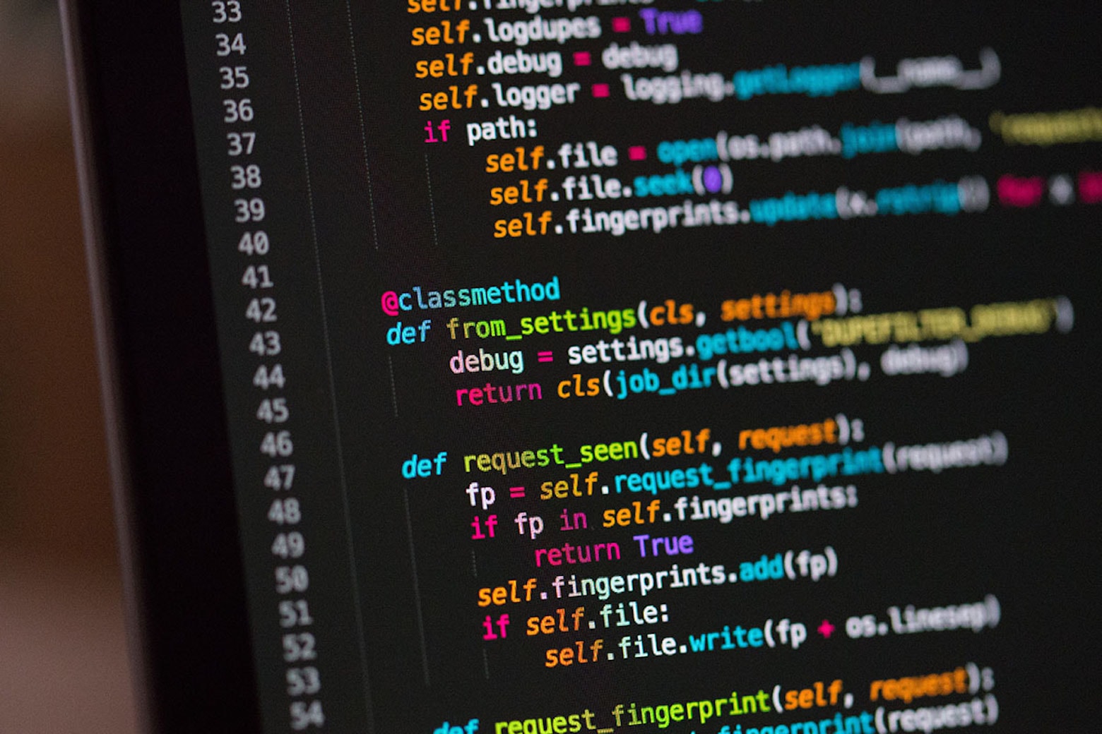 A computer screen with code on it to illustrate a sale for the Ultimate Cybersecurity & IT Career Certification Pathway Training Bundle.