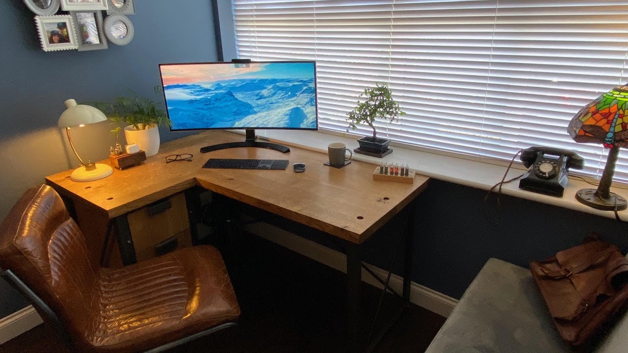 In this setup, an LG curved monitor is great for work as well as movies and TV.