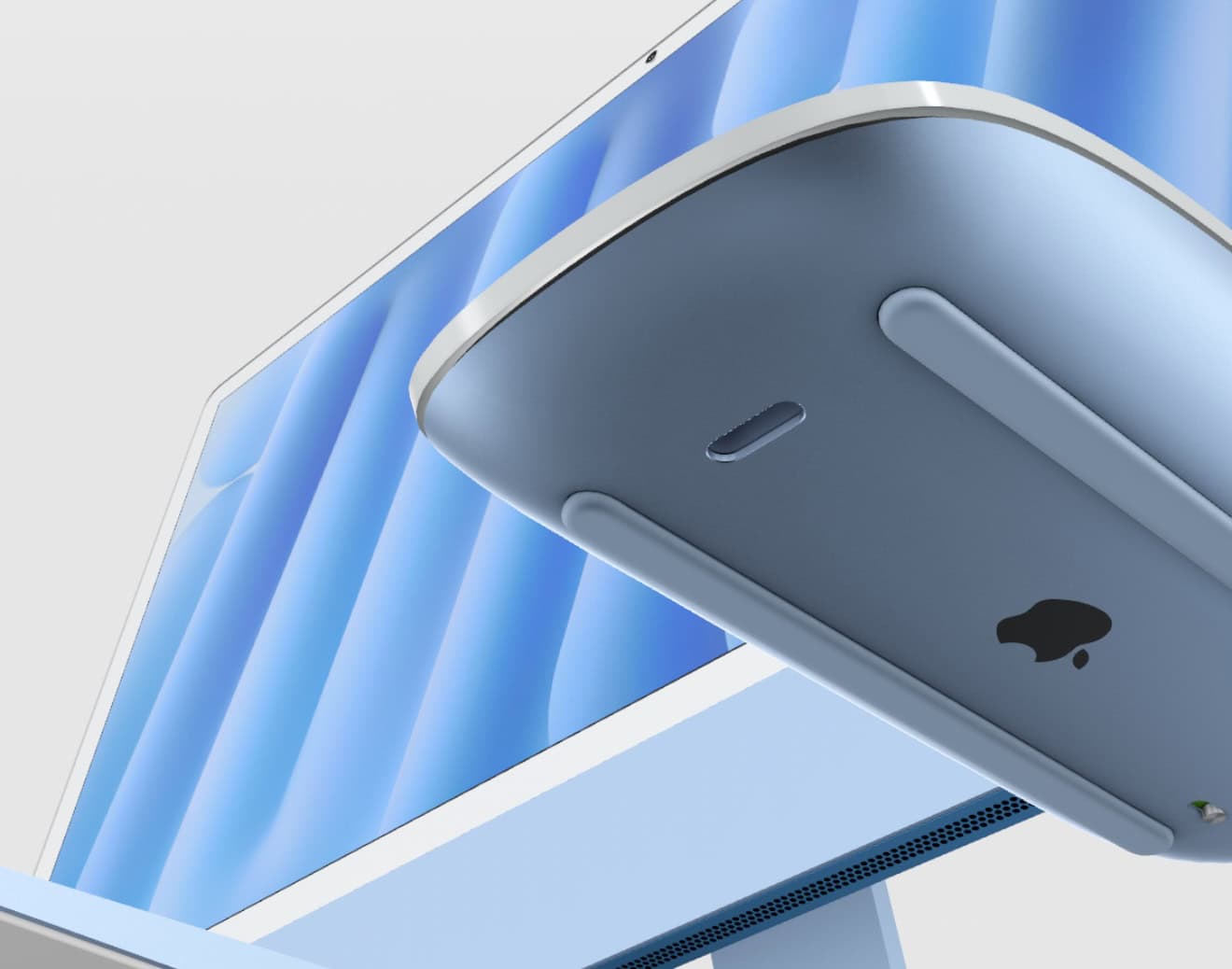 M4 iMac Magic Mouse with the USB-C charging port on the bottom.