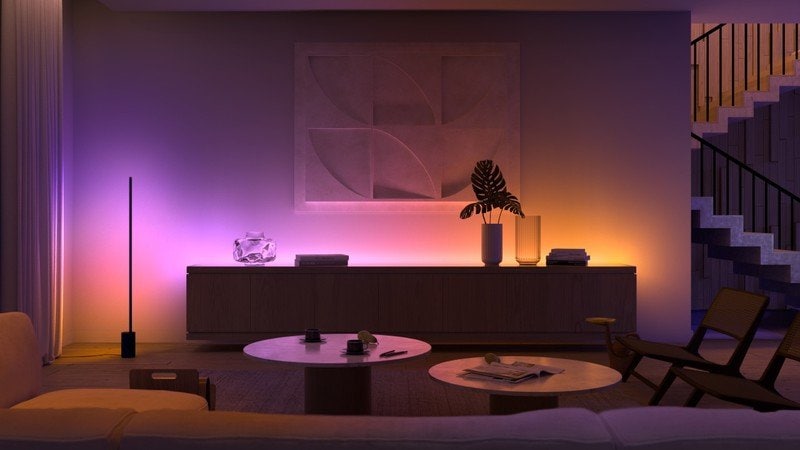 The Signe floor lamp and a light strip add ambiance.