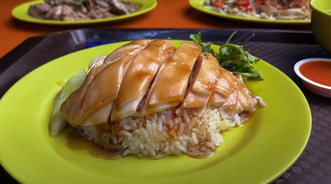 People in Singapore are passionate about chicken and rice like New Yorkers are passionate about pizza.