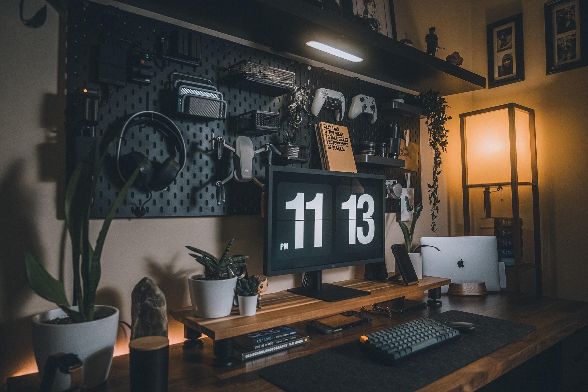 This setup just added an LG UltraFine display, but it's the pegboards everybody's raving about.