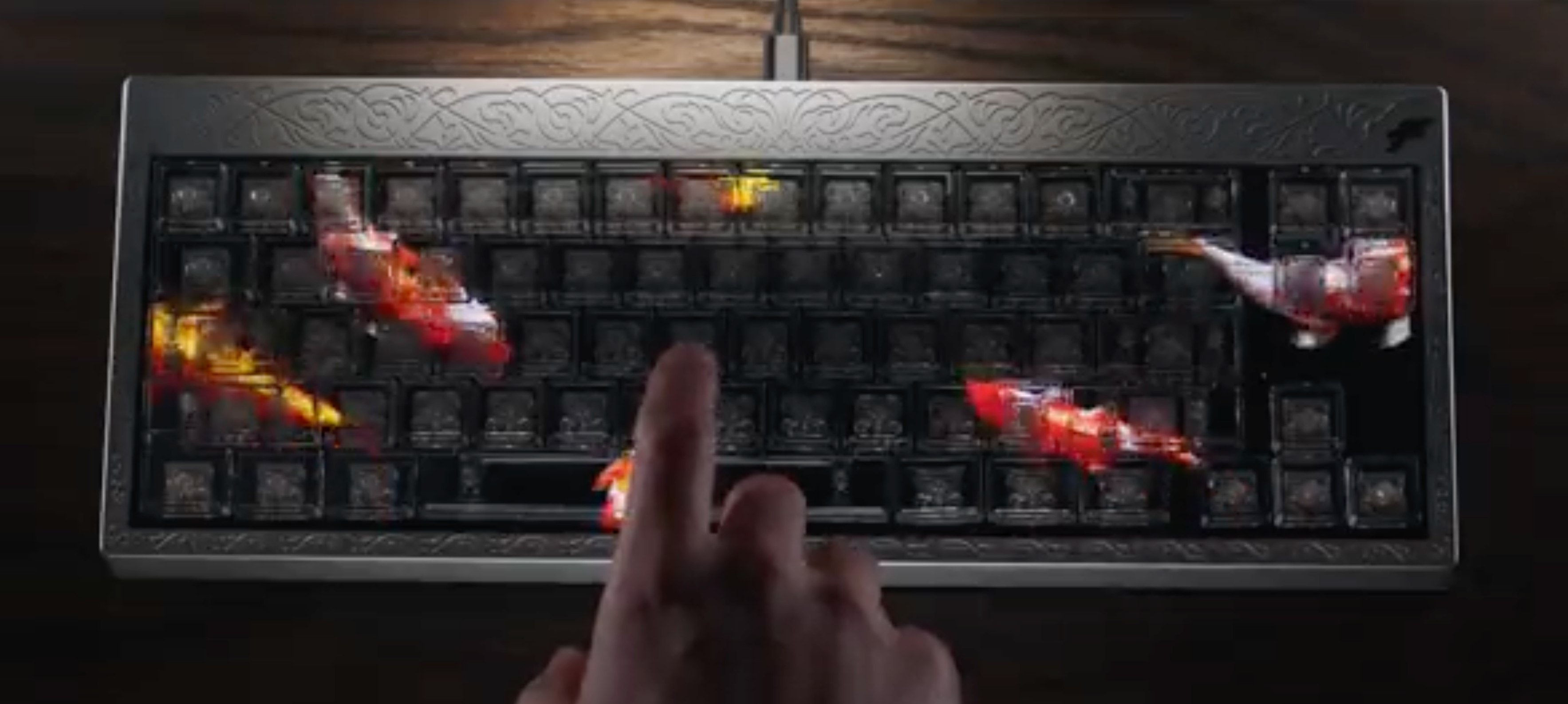 As soon as that finger contacts the key, a ripple is going to scatter those koi fish.