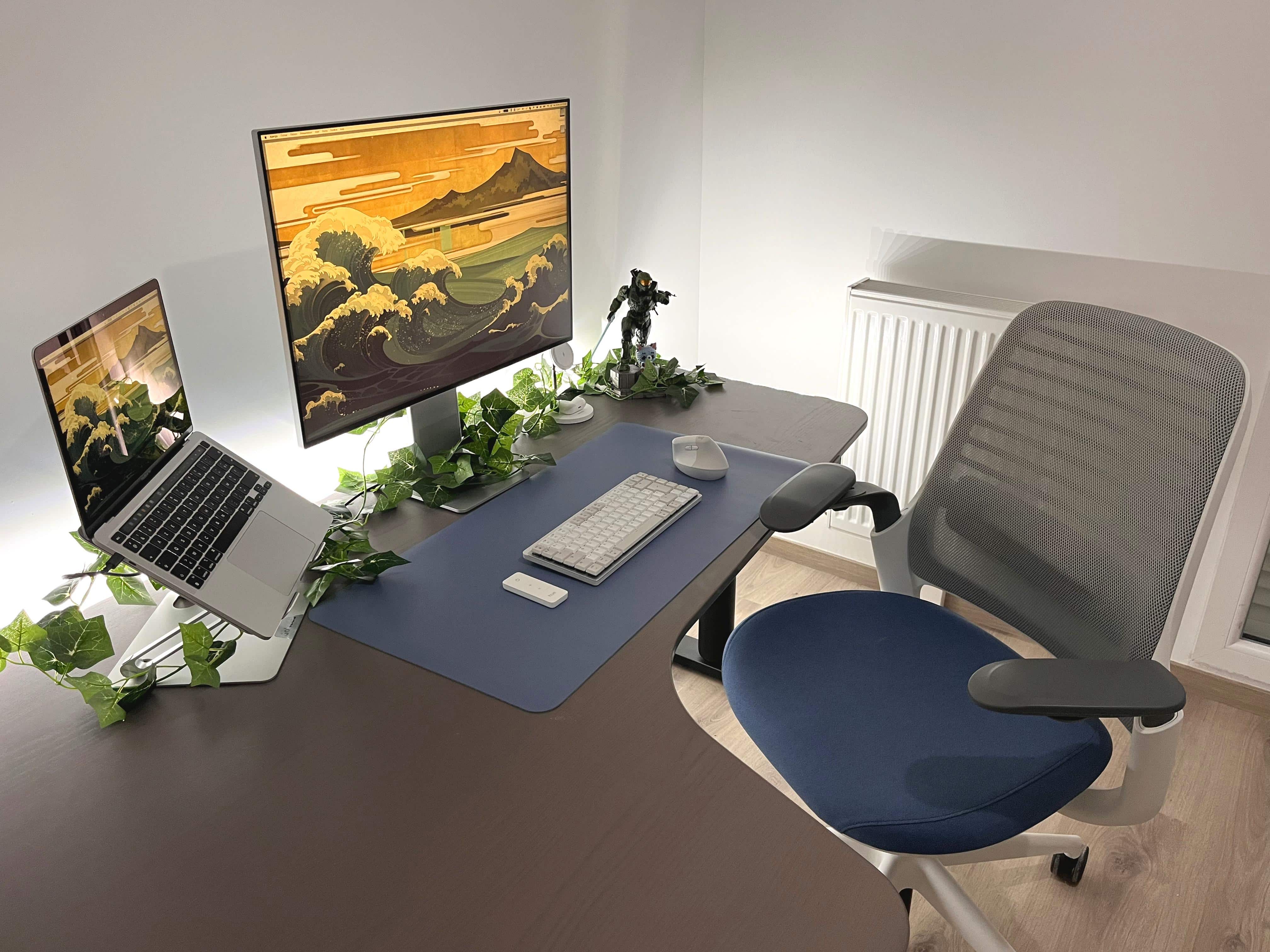 Under-desk lighting helps make it a pleasant workspace even with no windows.