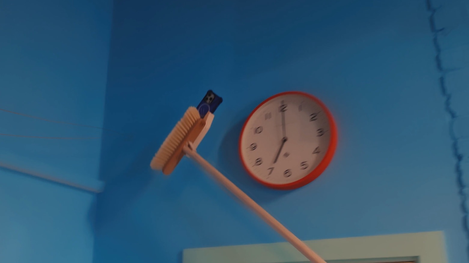 Crazy invention snoozes an iPhone in the most ridiculous way possible