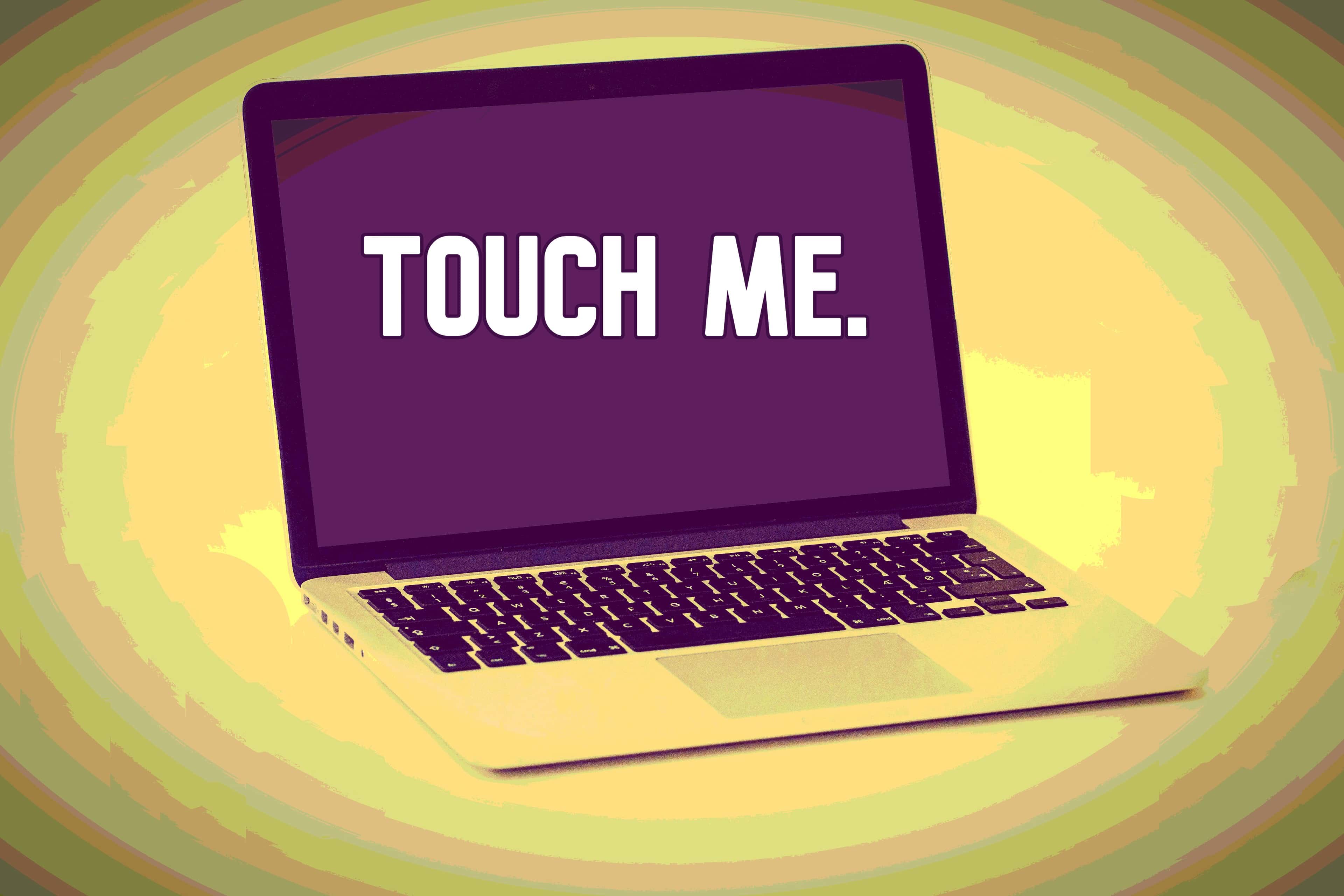 A MacBook Pro with the text 