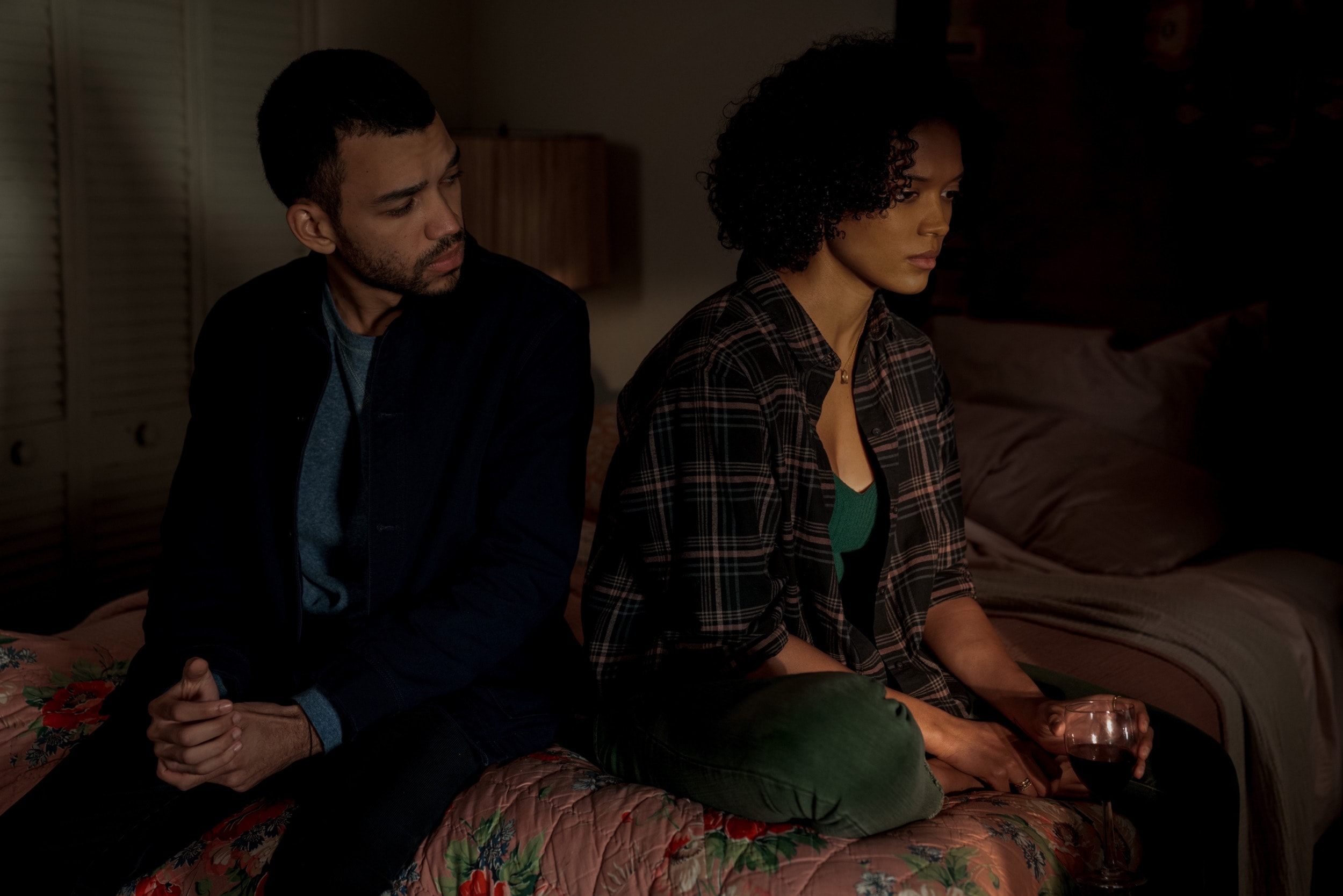 Justice Smith and Briana Middleton in a scene from Sharper, a neo-noir thriller on Apple TV+.