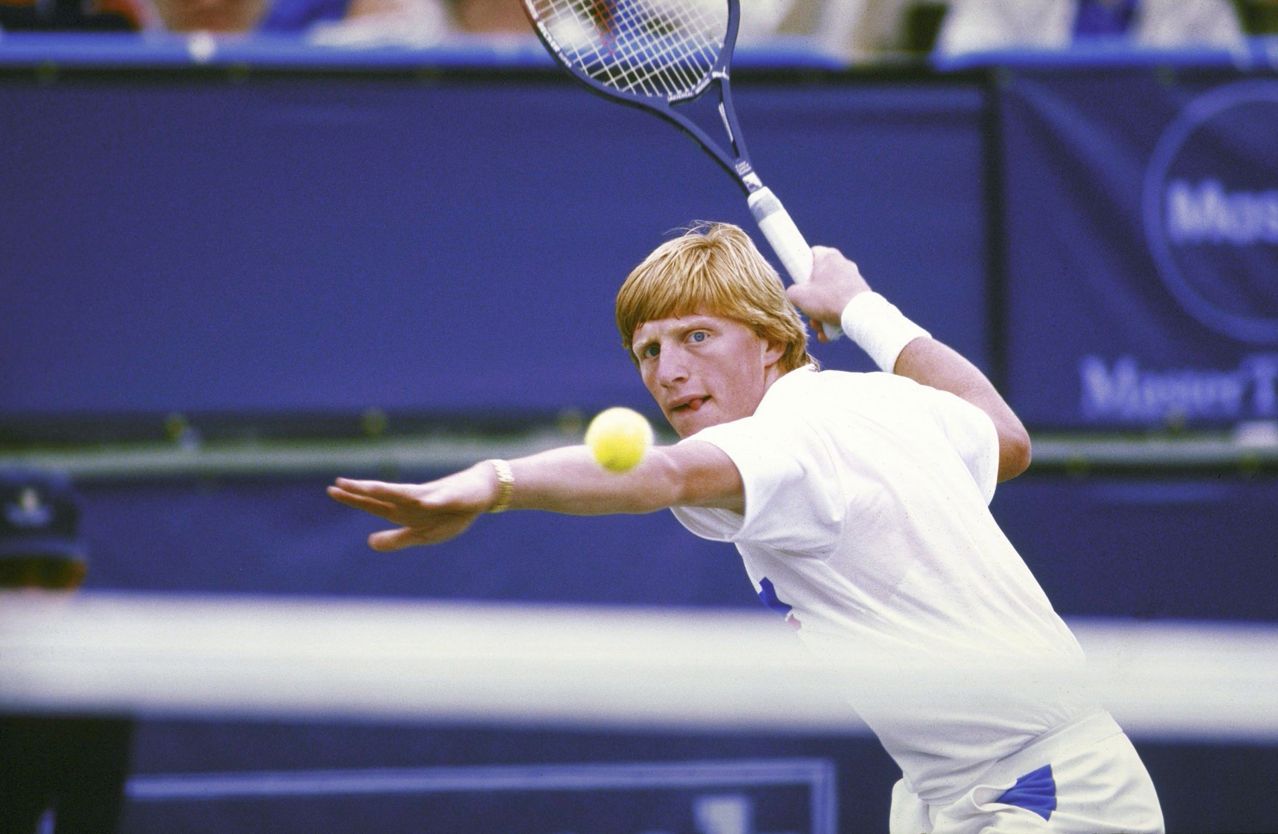 Tennis champ Boris Becker takes aim at a ball in archival footage from sports docuseries 