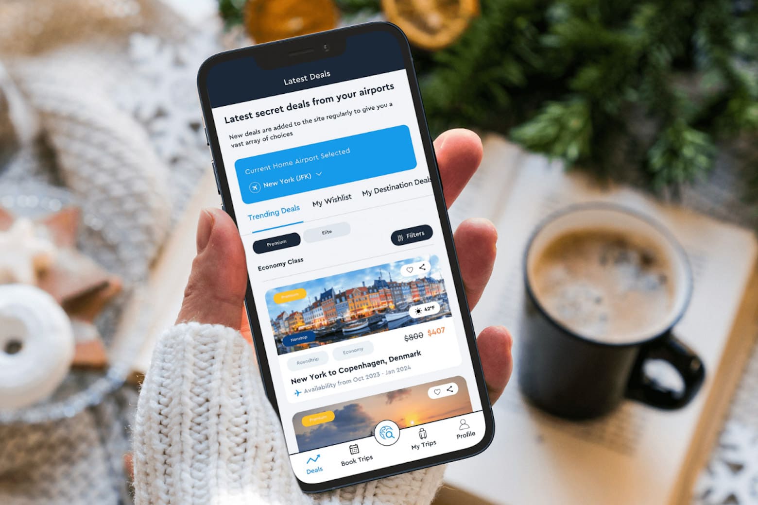 Photo of a hand holding an iPhone, with the OneAir tool for finding cheap flights.