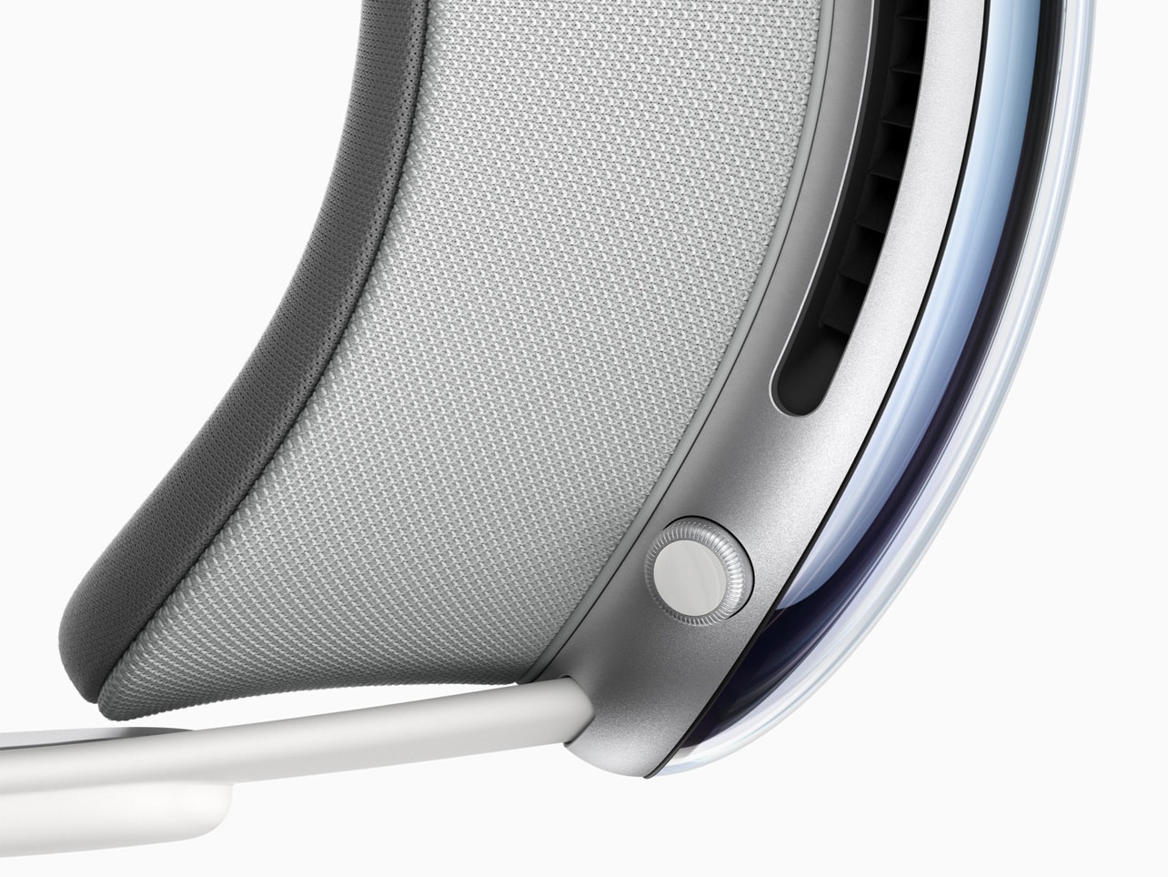 From left to right: The glass of Apple Vision Pro flows seamlessly into the custom aluminum alloy frame, gently curving around the user’s face, while a modular system of parts — including the Light Seal and Head Band — allows for a tailored fit.