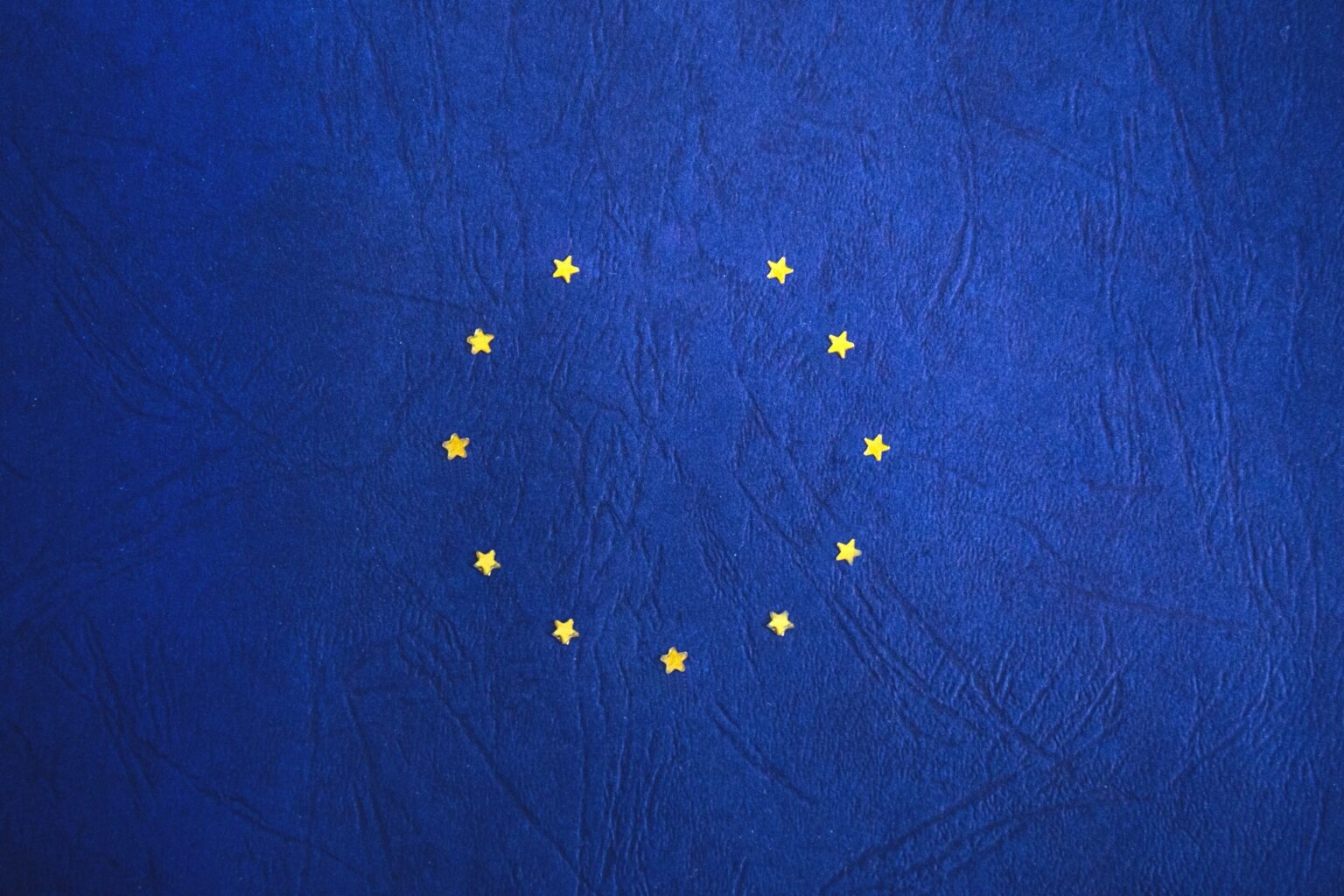 An EU commissioner called on Tim Cook to open up Apple's closed ecosystem of hardware and software.
