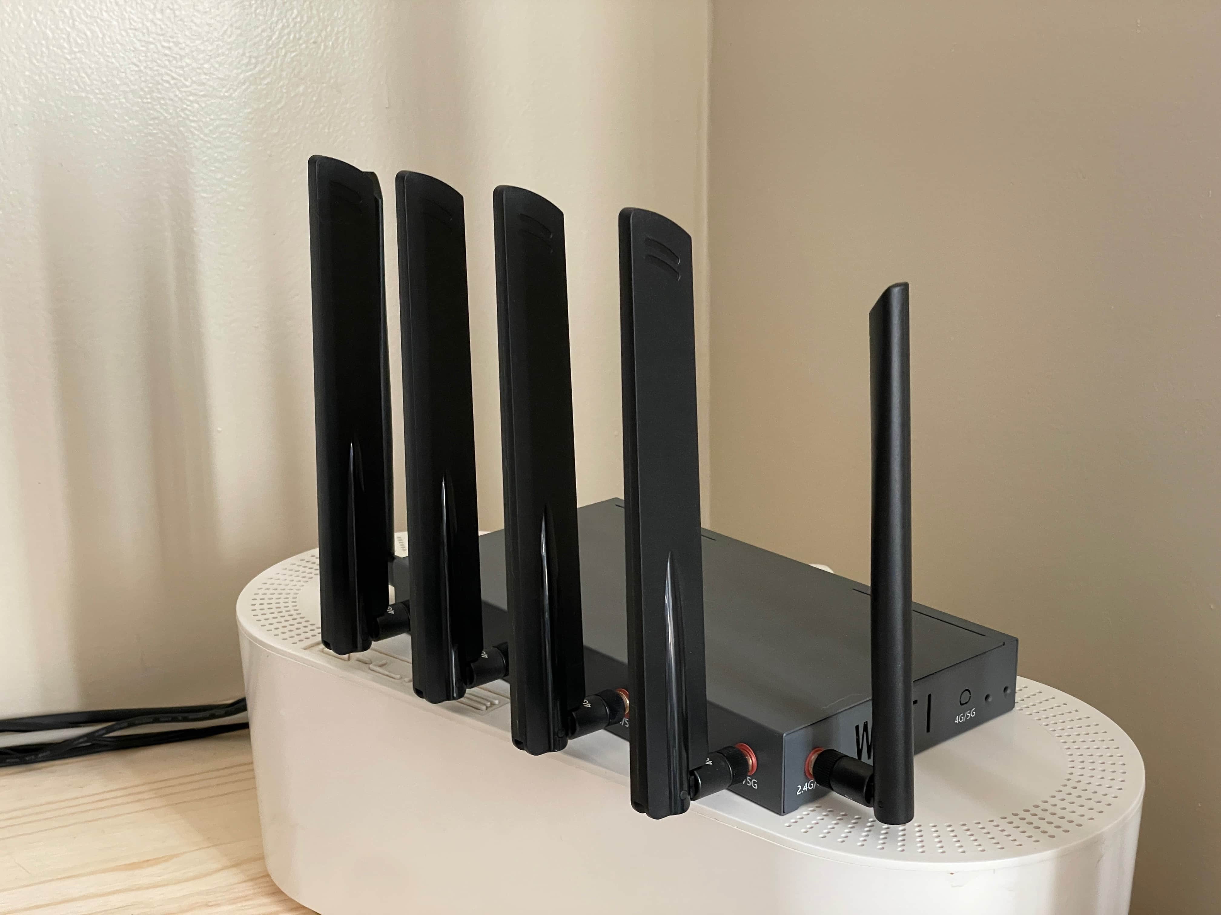 EZ Internet Solutions router sitting on a cable box