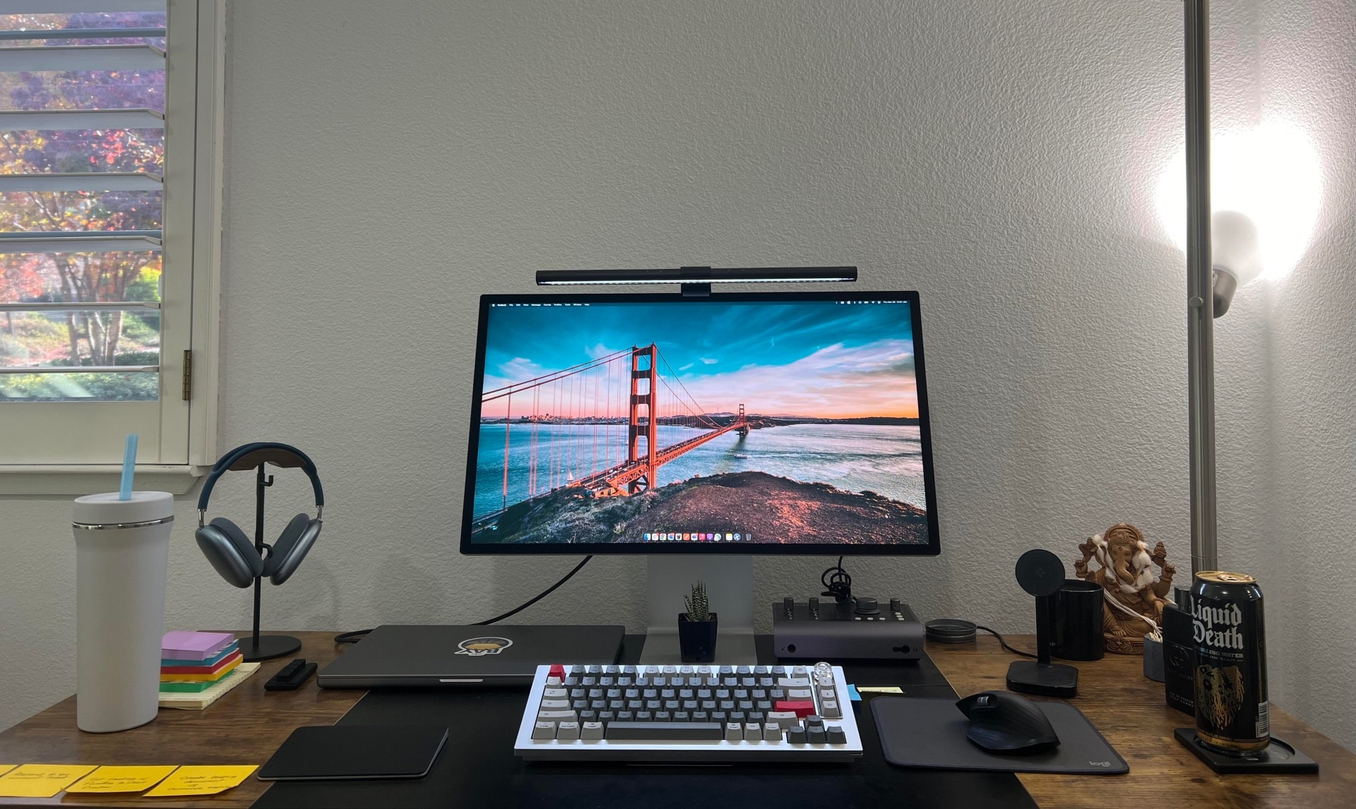 Computer setup with M2 Pro MacBook Pro and Studio Display