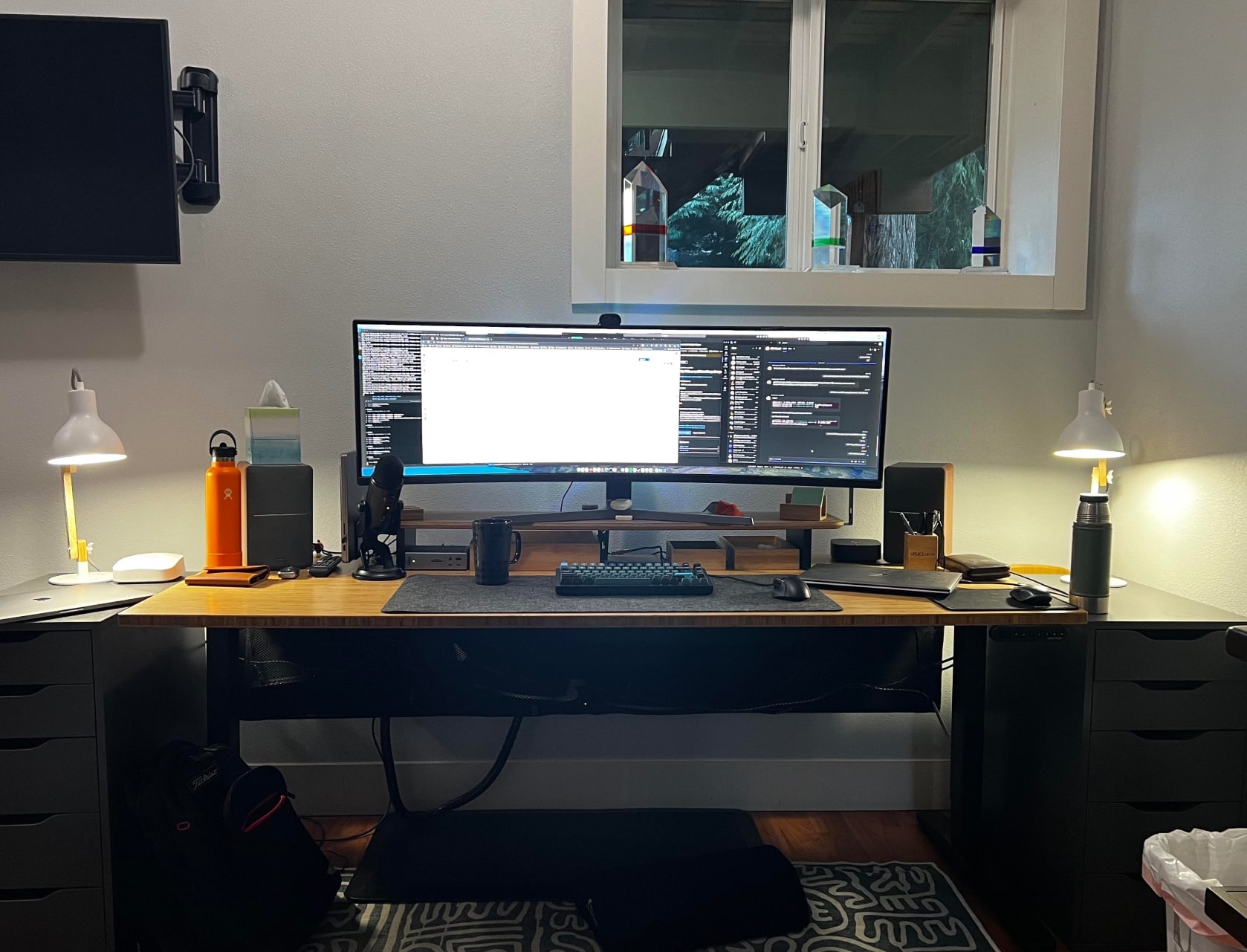 MacBook Pro setup with ultra-wide Samsung display